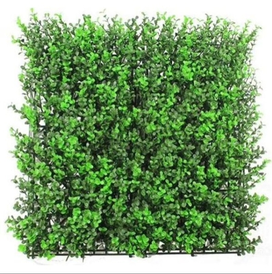 L'herbe verte pour mur artificiel est une solution parfaite, peu d'entretien, décoration de haute performance pour les activités en salle et en plein air.