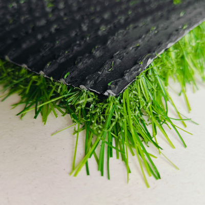 Céréales synthétiques non remplies 25 mm Herbe artificielle haute Dtex Pour les terrains de sport et les décorations paysagères