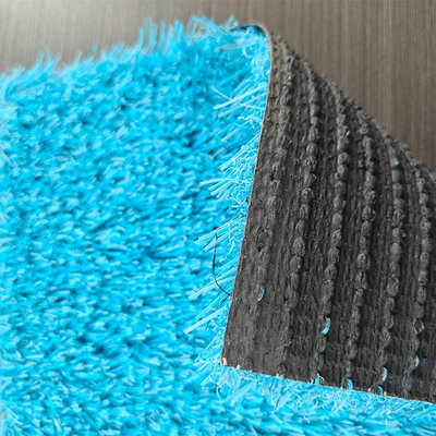 Hauteur de pile 25 mm 10000 Dtex Anti-statique Sport Herbe artificielle avec surface bleue et support et revêtement personnalisables